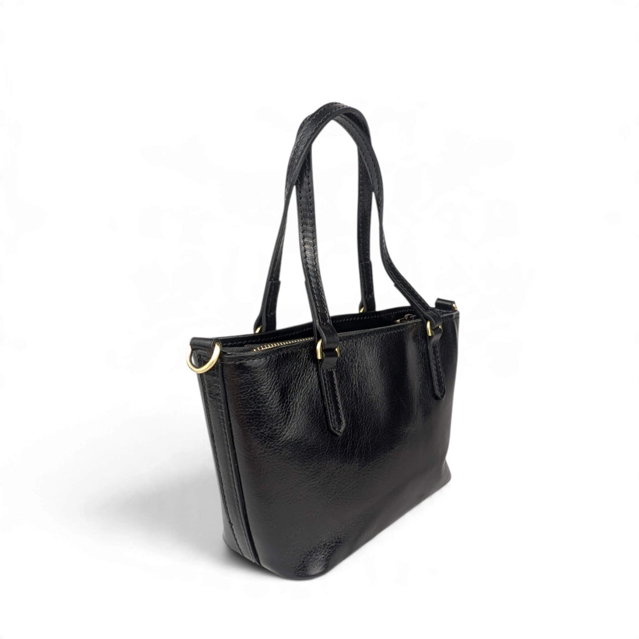 Black leather handbag, back view from the left, House of Enira Isual