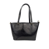 Black leather handbag, front view, House of Enira Isual