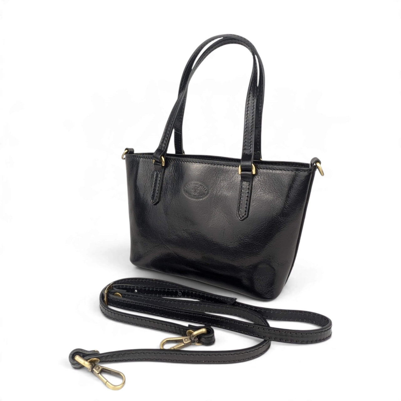Black leather handbag, front view from the right (2), House of Enira Isual
