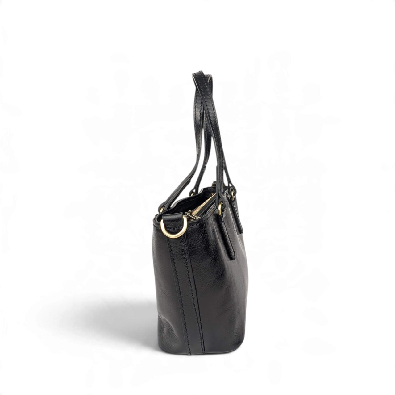Black leather handbag, side view, House of Enira Isual