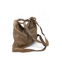 Dark taupe woven leather shoulder bag, worn as a backpack, back view, House of Enira Licea