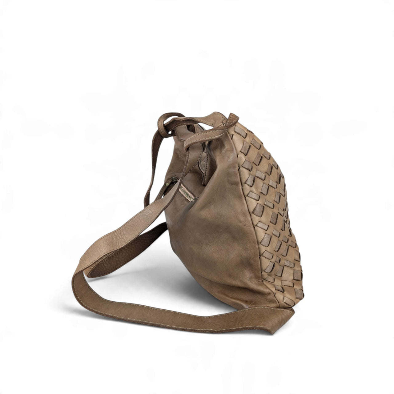 Dark taupe woven leather shoulder bag, worn as a backpack, back side view, House of Enira Licea