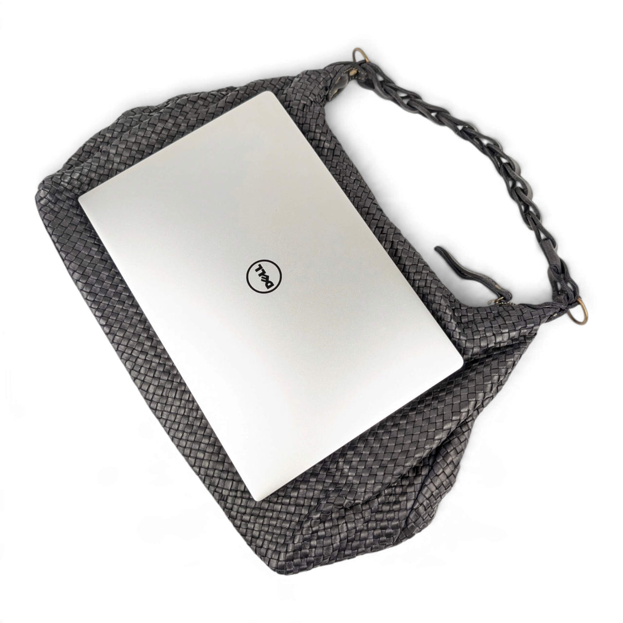 13-inch laptop resting horizontally on top of the black Talisca hobo bag, House of Enira