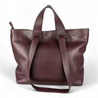 Handmade Italian dual material suede and pebbled leather shopper in the color burgundy red with 2 handles and 2 shoulder straps