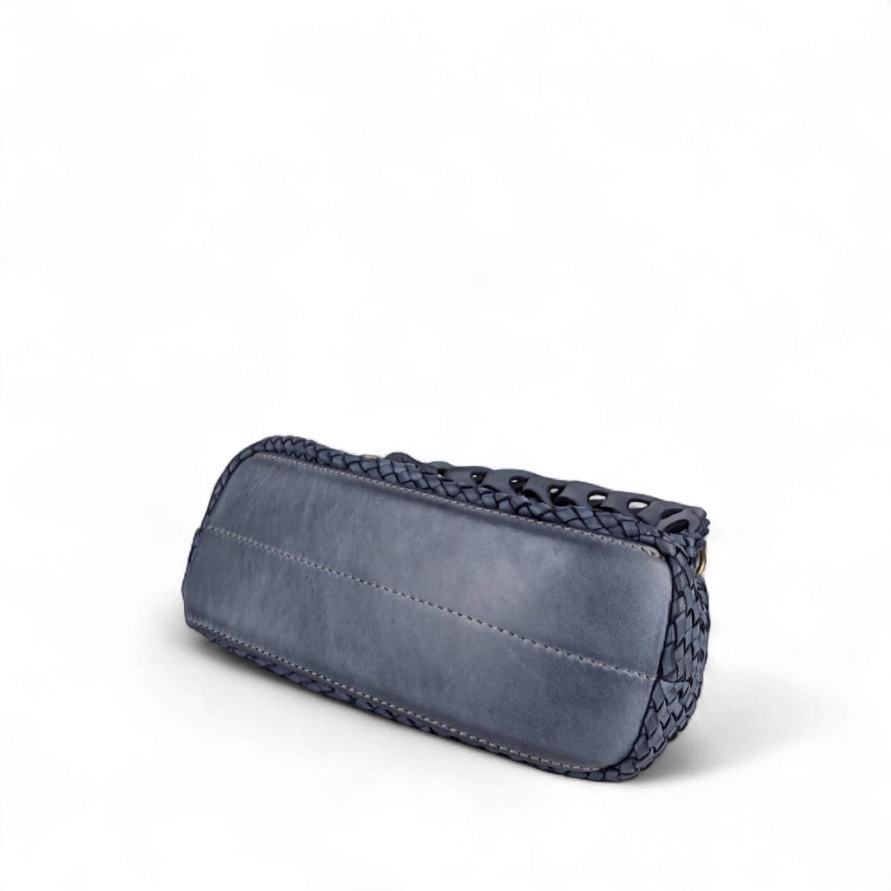 Small navy woven Italian aniline leather shoulder bag with thick braided strap and additional long strap.